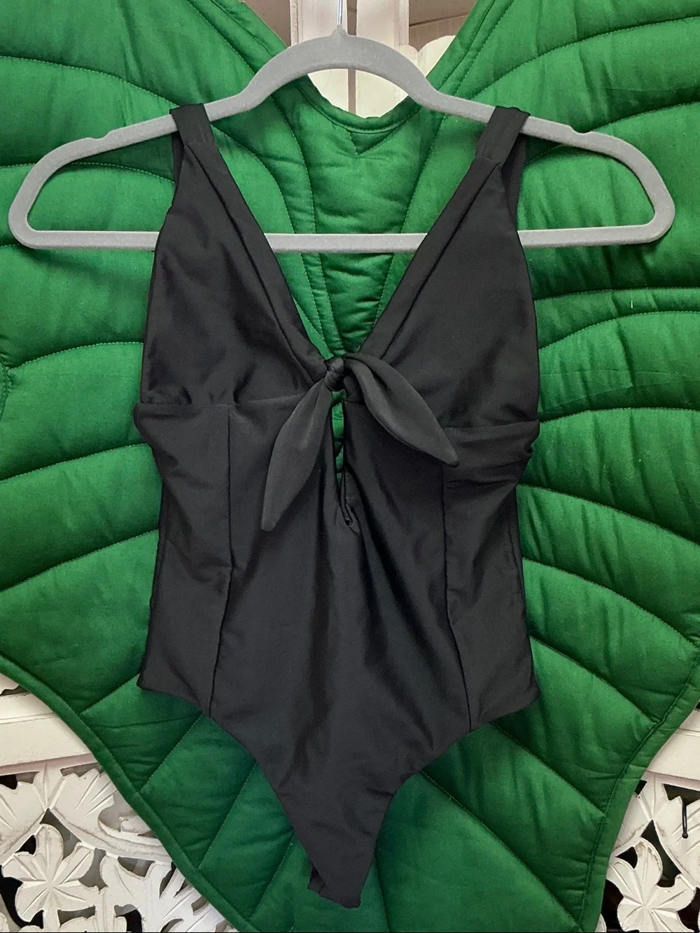 Benoa black one piece swimsuit front bow tie, low V back, size L